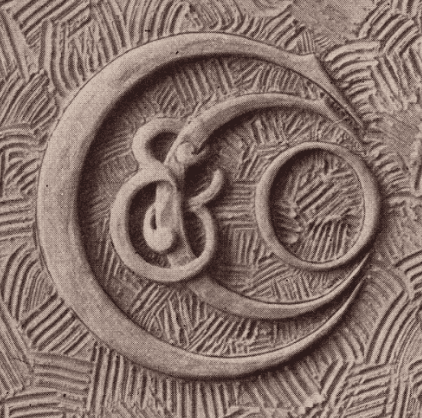 The Corning & Company monogram